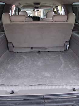 Clean back floorarea of car.